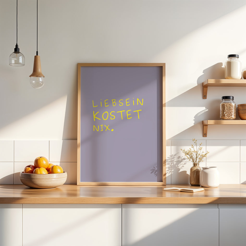 Modernes Typografie Wandbild mit Humor-Spruch „Liebsein kostet nix“