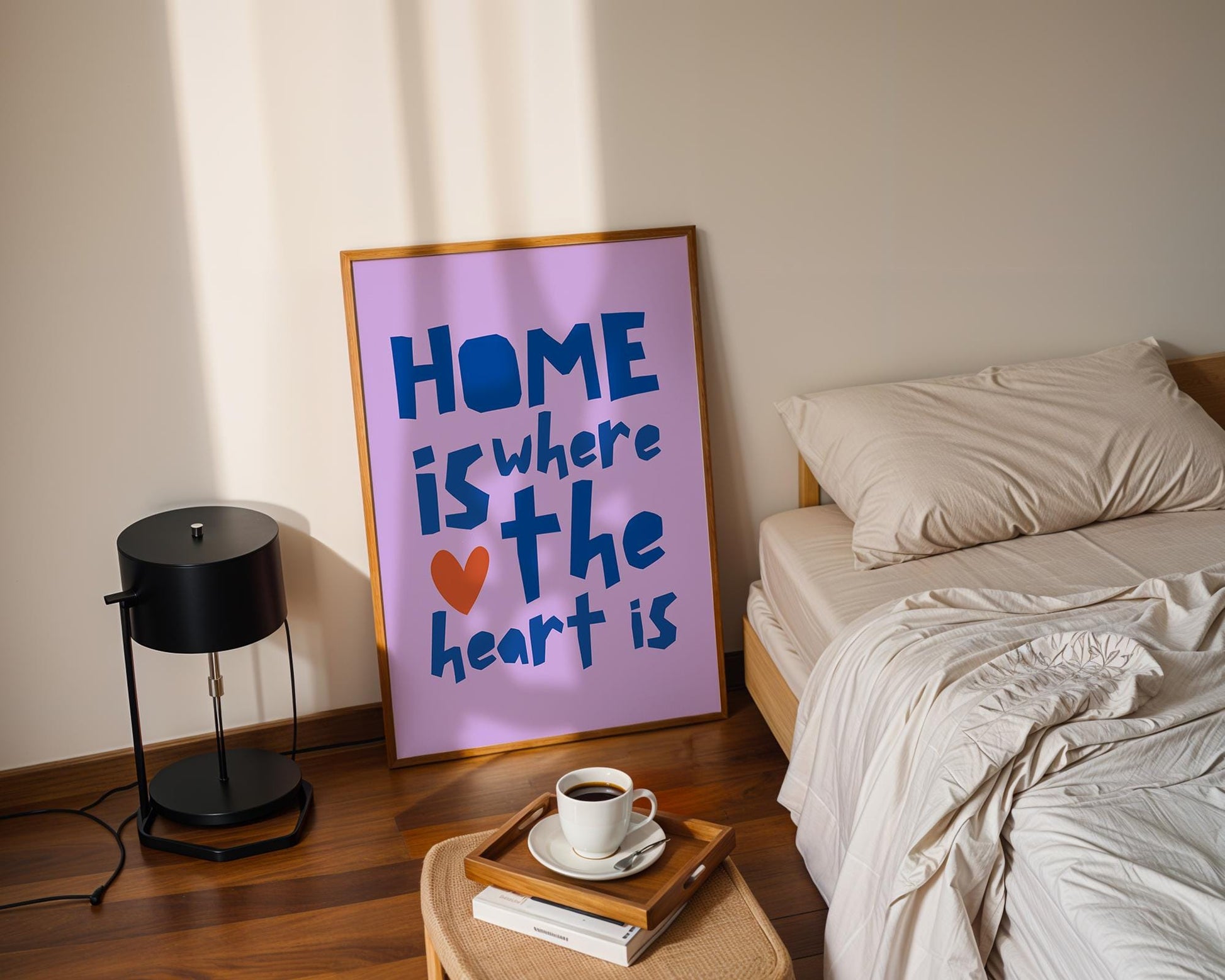 &quot;Poster with the quote &#39;Home is where the heart is&#39; in purple and blue typography, featuring a red heart and vibrant, bold design. Modern home decor.&quot;