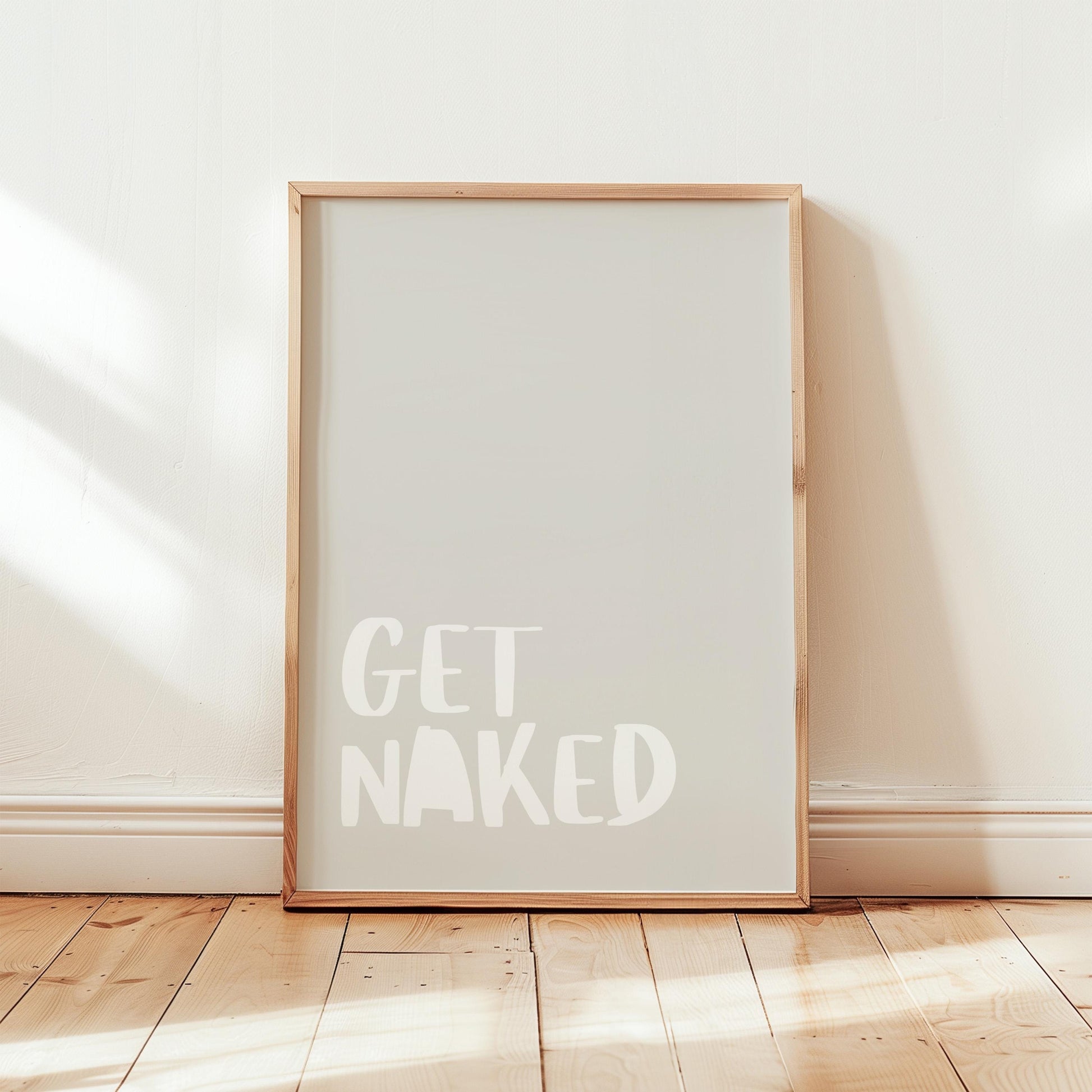 Get Naked Poster | Bold typography on a beige background. A creative statement piece for minimalist spaces with humor and style.