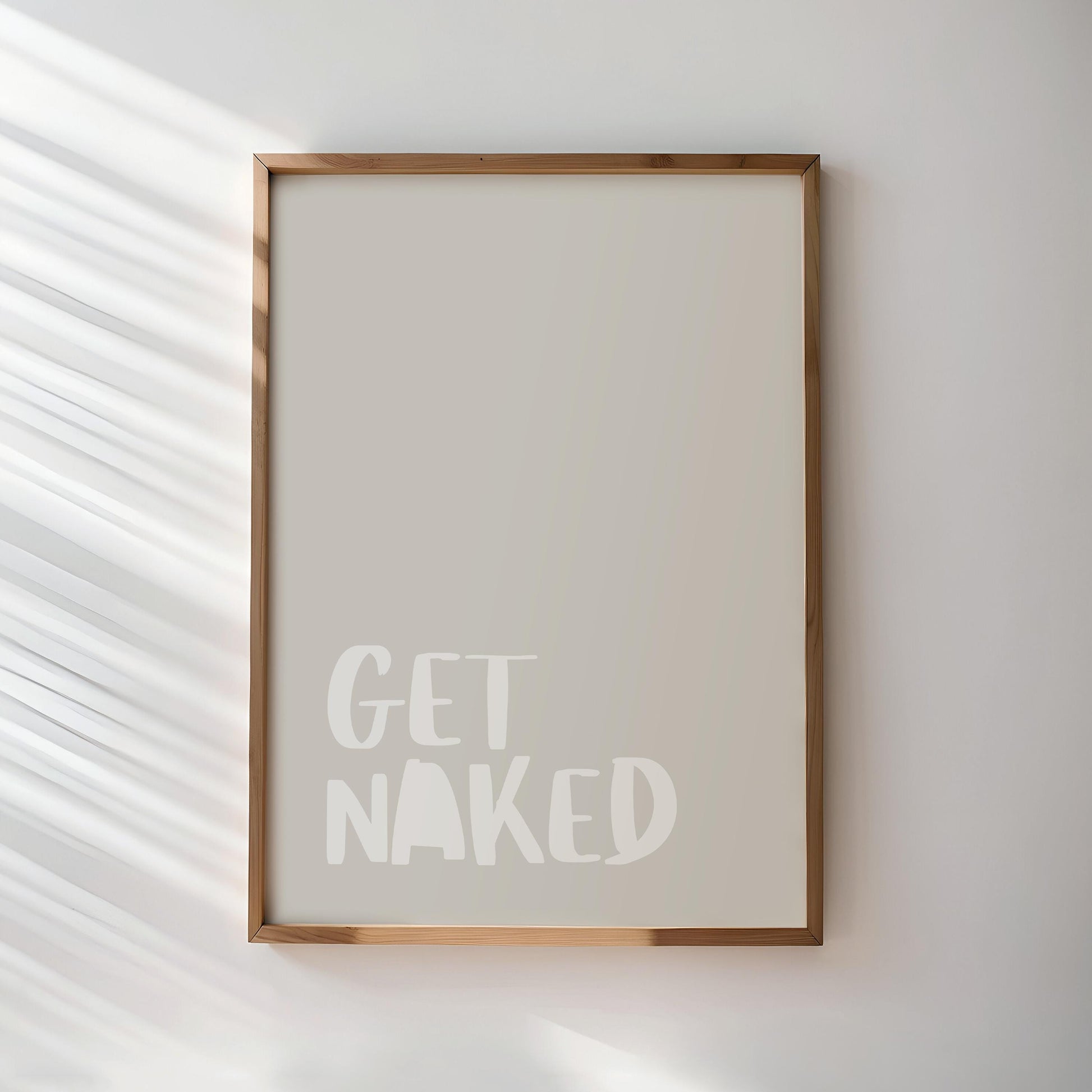 Get Naked Poster | Bold typography on a beige background. A creative statement piece for minimalist spaces with humor and style.