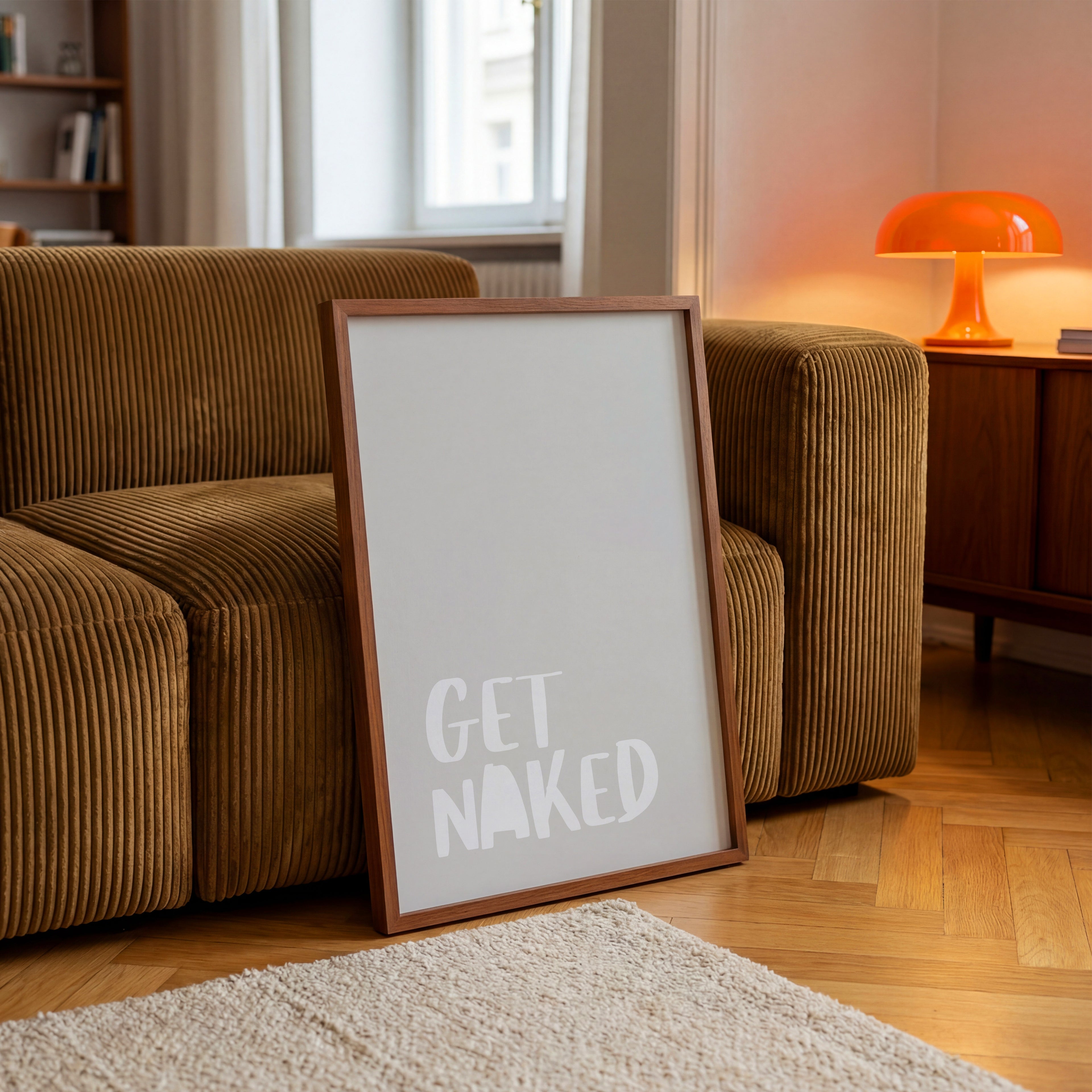 Modern typography poster featuring “GET NAKED” in clean, minimal lettering on a neutral background. This wall art blends humor with contemporary design, creating a subtle yet bold statement. Ideal for bathrooms, bedrooms, or gallery walls, it adds character and a relaxed vibe to modern home decor.