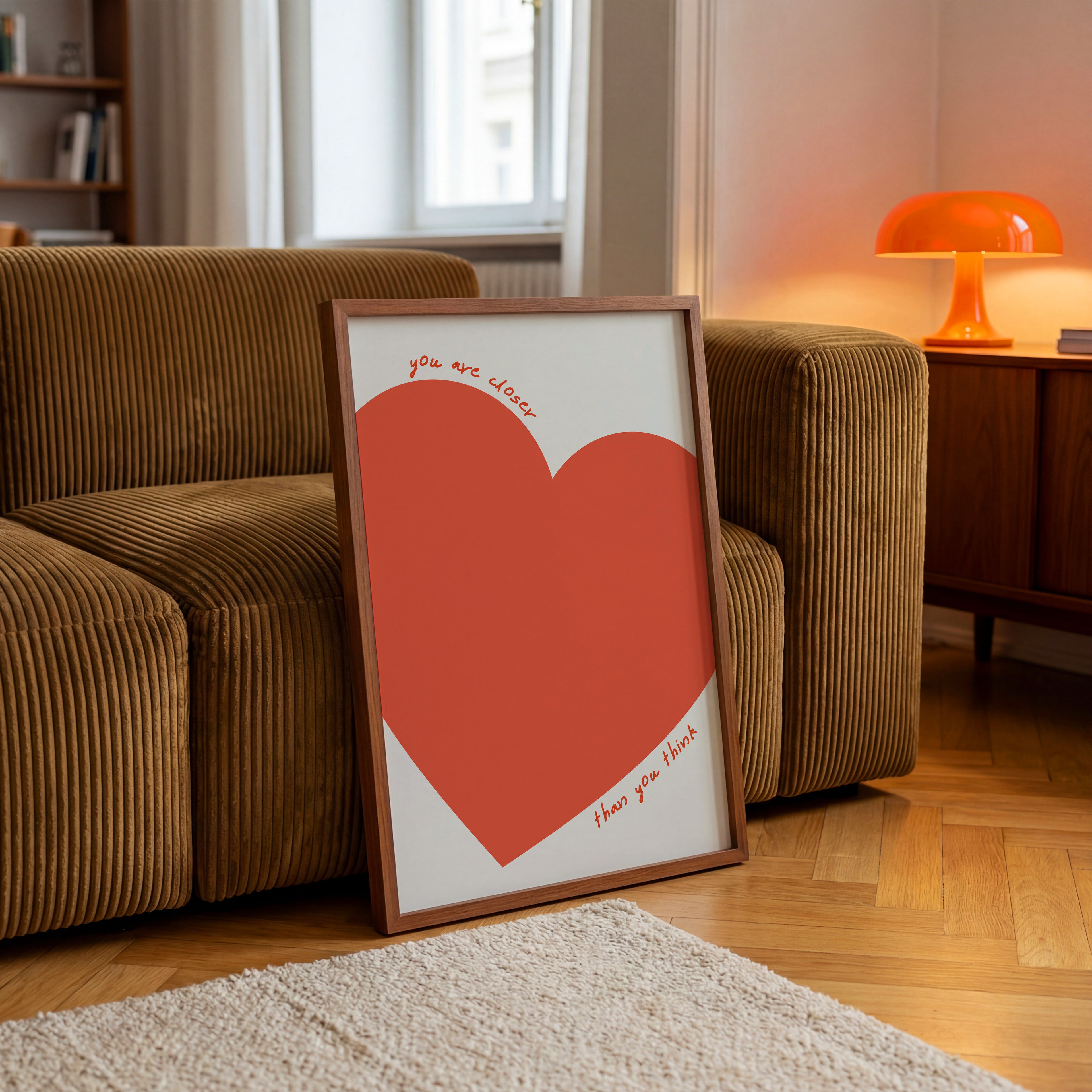Minimalistisches Poster mit großem roten Herz und handgeschriebenem Schriftzug You are closer than you think – moderne Wanddeko für Wohnzimmer

Aesthetic Typografie Poster mit emotionalem Spruch und Herzmotiv in warmem Rot – stilvolle Wandkunst für Schlafzimmer oder Büro